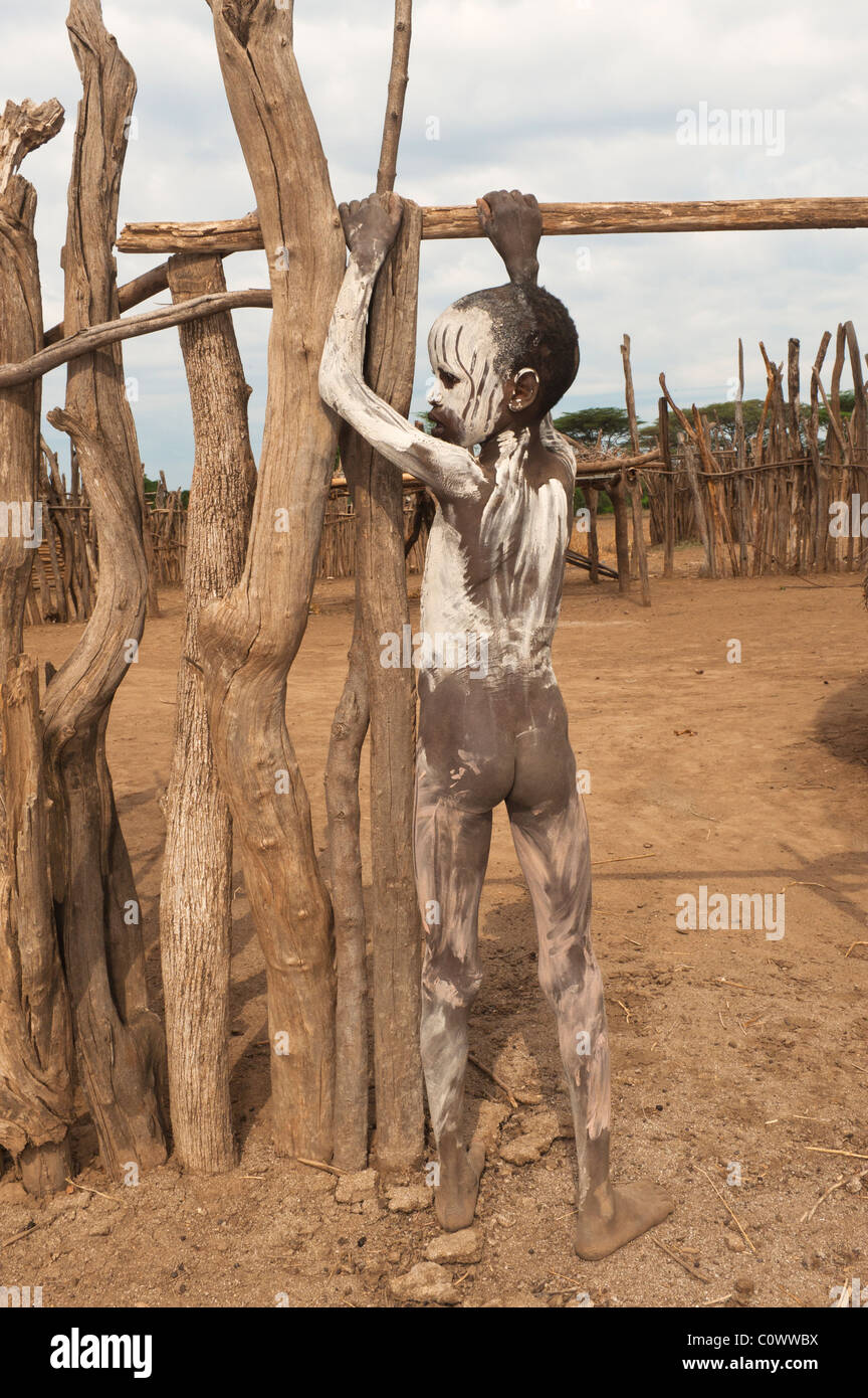 Karo boy with facial and body paintings, Omo river valley, Southern Ethiopia Stock Photo