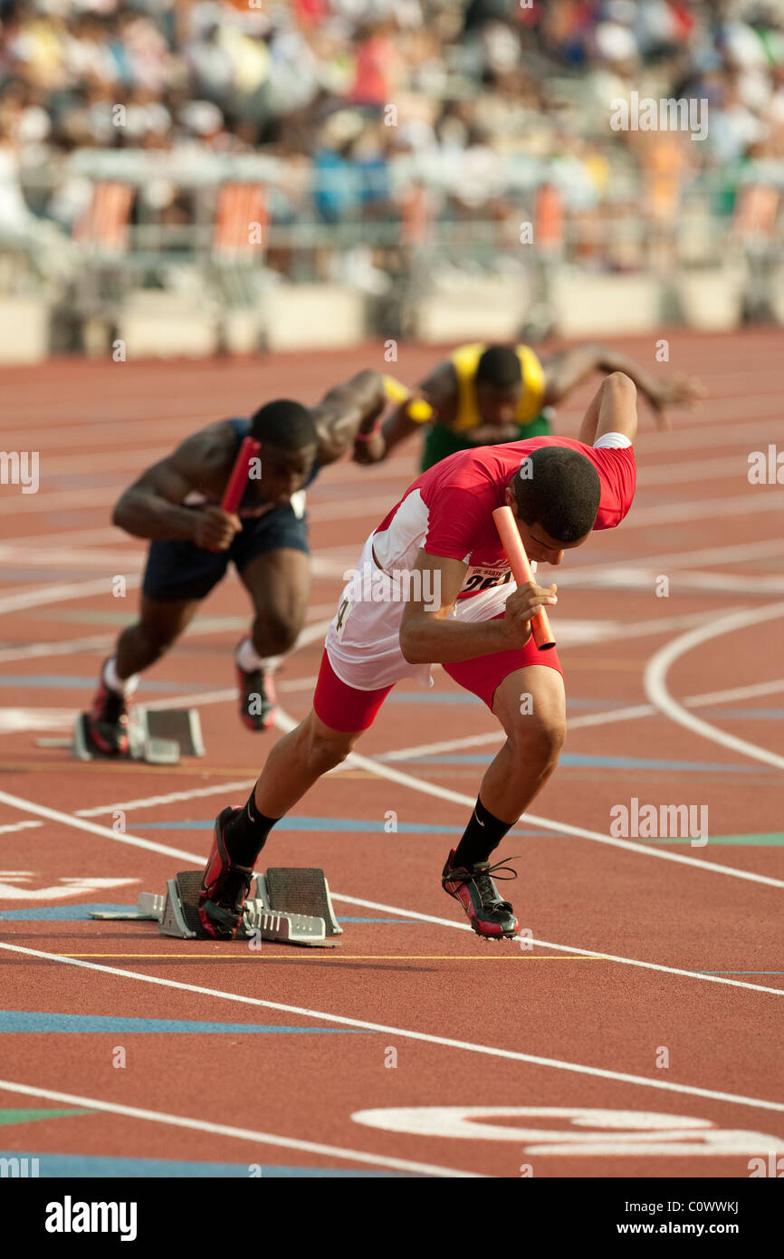 AfricanAmerican boys at the start of the 4x100 yard relay race at the