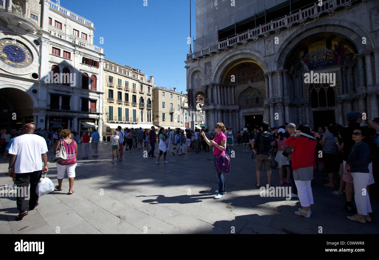 Tourist in St Marks Square Piazza venice italy Stock Photo