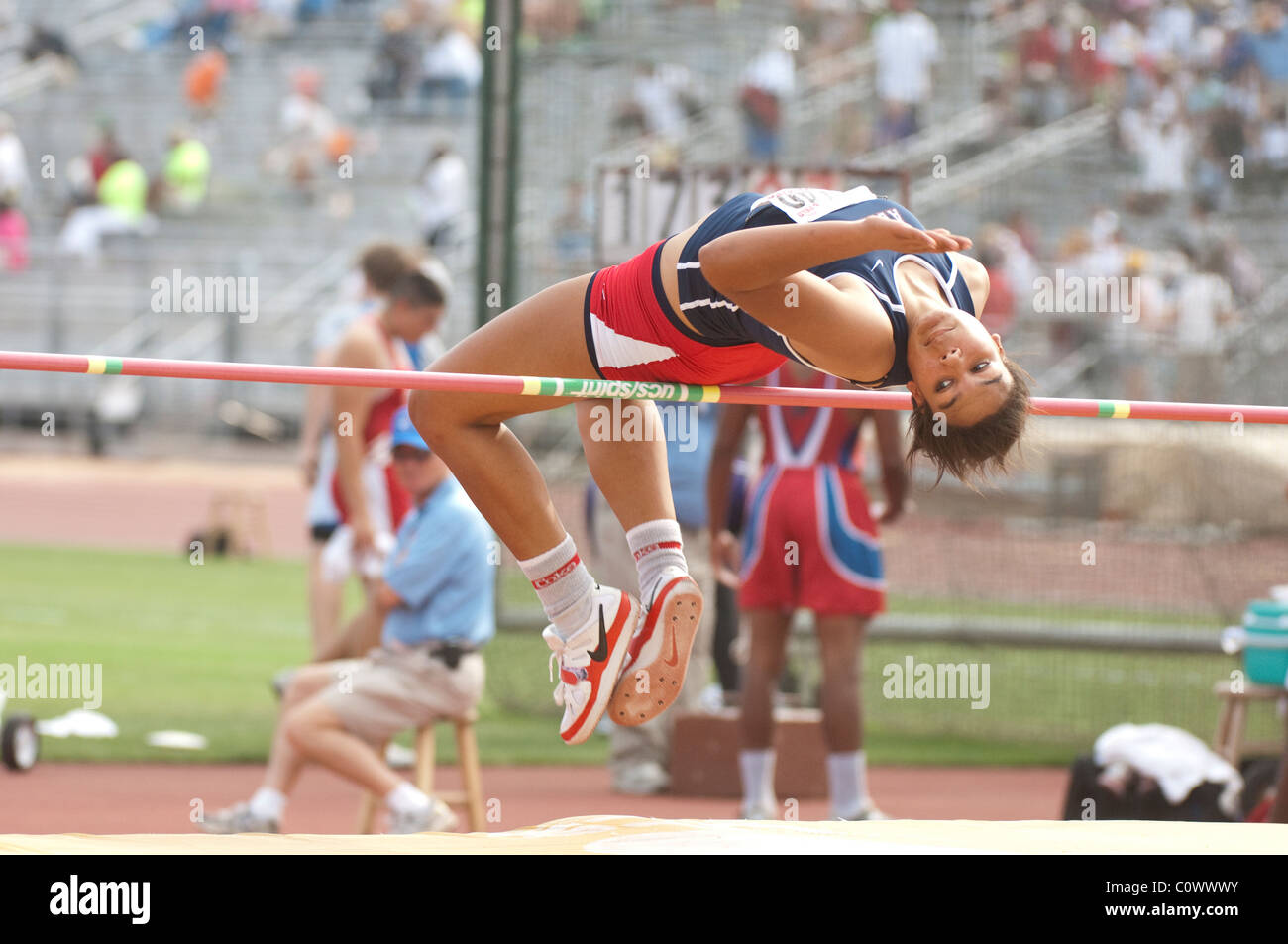 Female high jumper competes at the Texas state UIL high school state track meet at the University of Texas at Austin. Stock Photo