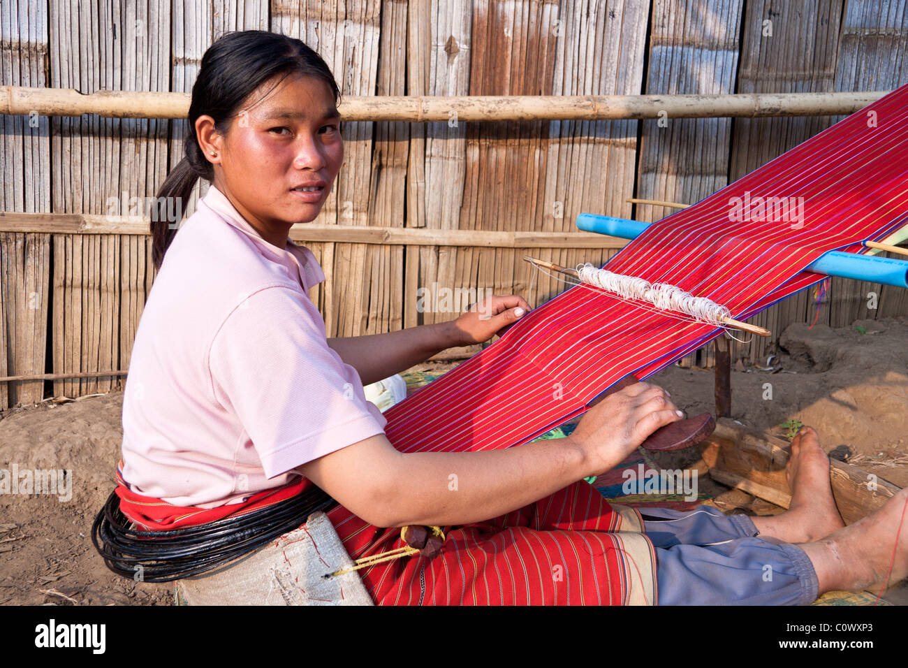 Woman from Palaung Minority Group (Ban Pang Hore) Weaving Fabric, Chiang Dao, near Chiang Mai, Thailand Stock Photo