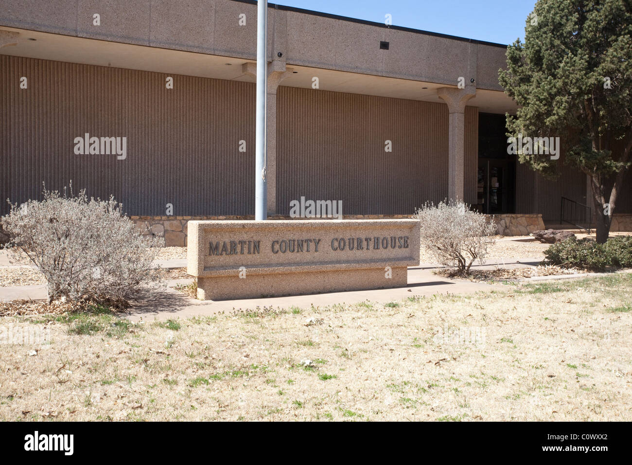 Exterior of Martin County Courthouse, built in 1975, showing stone sign