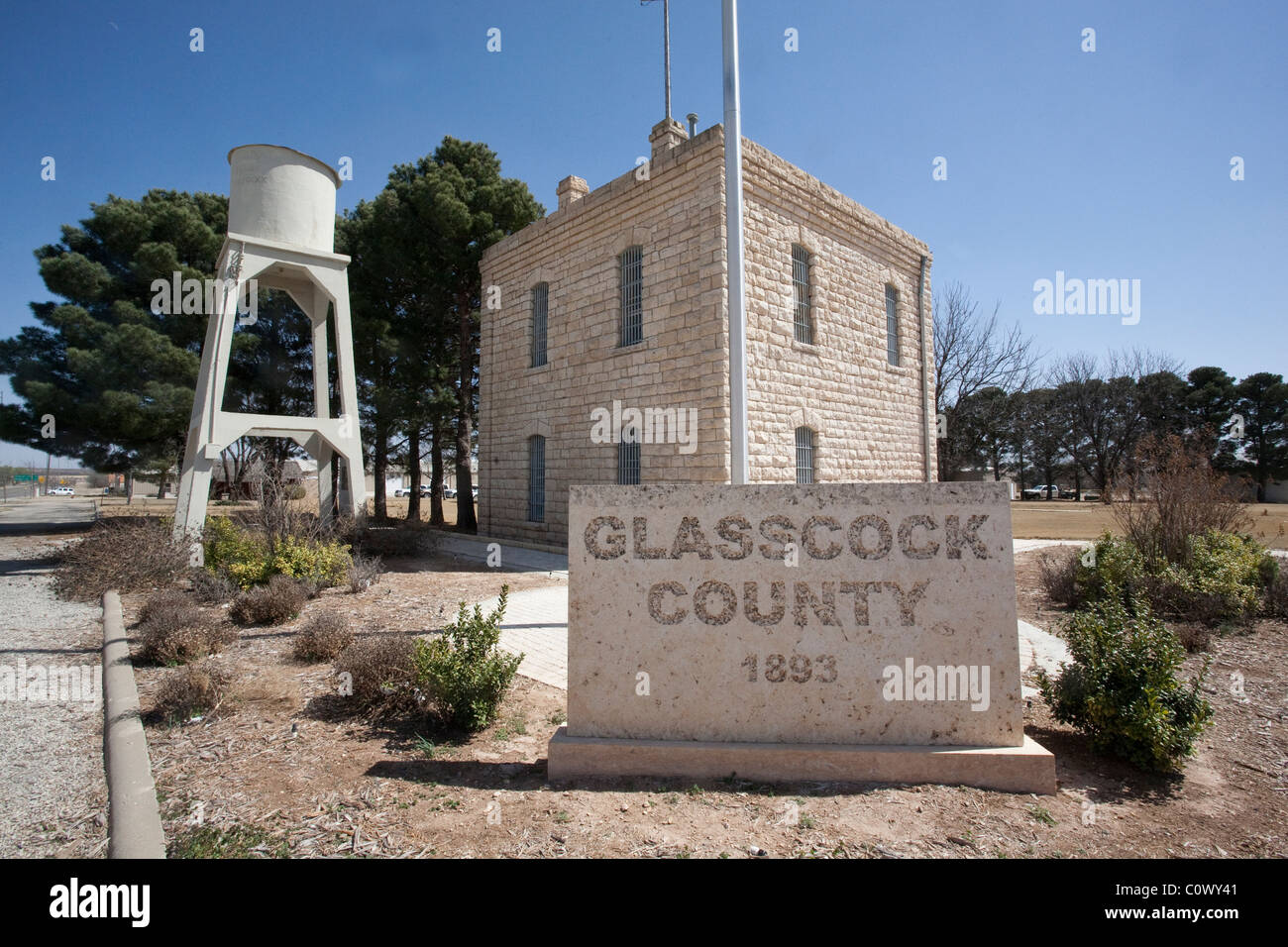 Glasscock County jail, built in 1893, behind site of original Glasscock County courthouse in small town of Garden City, Texas Stock Photo