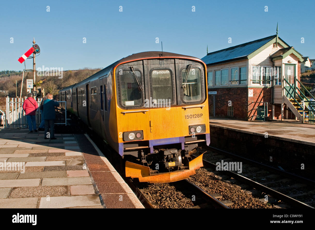 Passenger train leaving Lostwithiel Station in Cornwall Rural West of England Stock Photo
