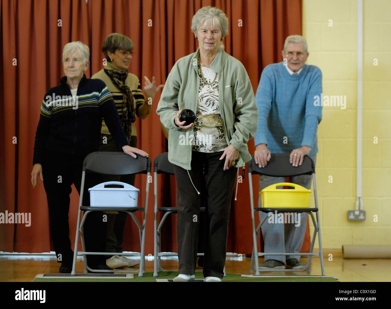 Ederlypeople playing indoor bowls Stock Photo