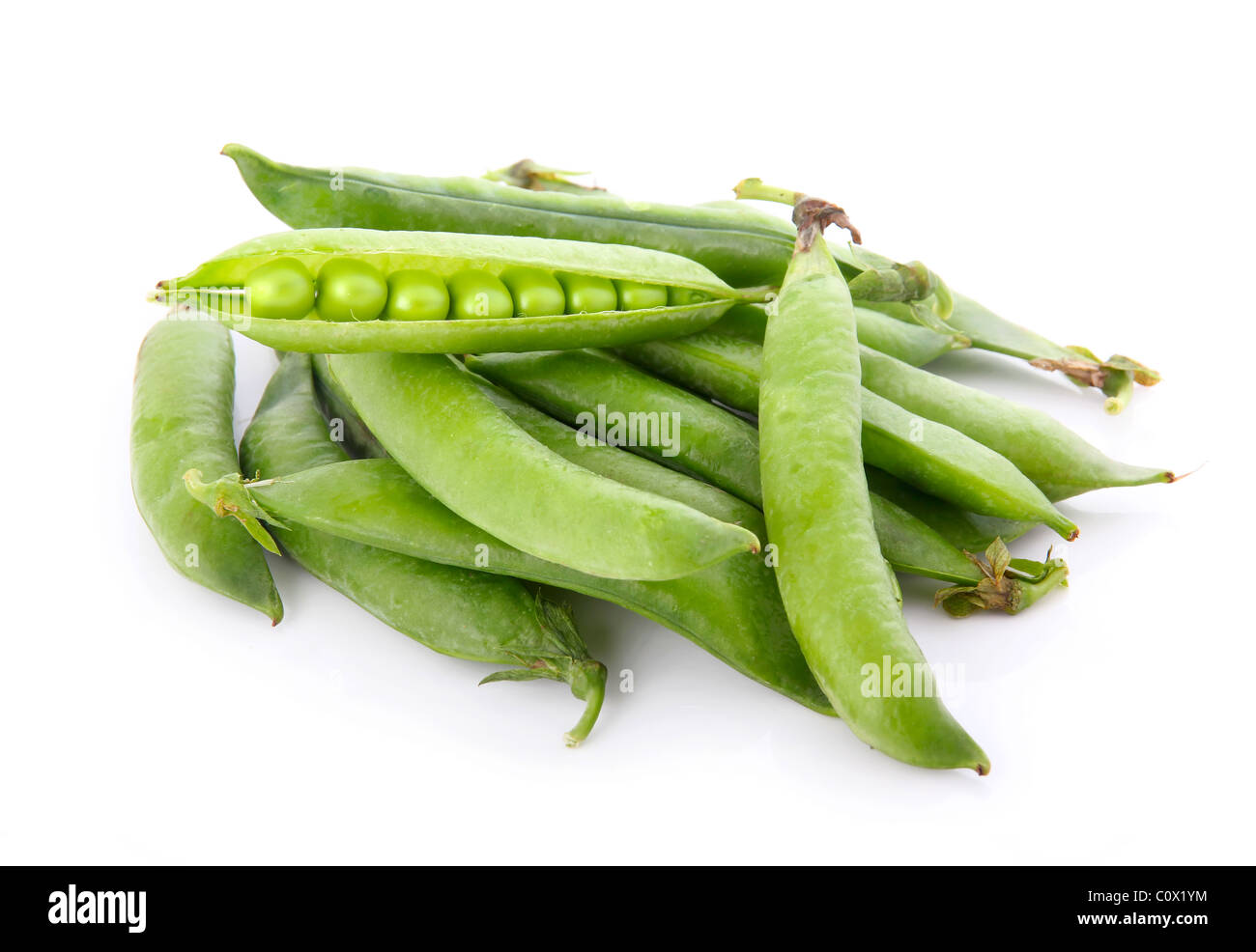 Ripe pea vegetable with green leaf isolated Stock Photo