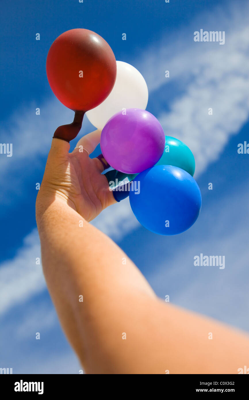 Fun with balloons against the sky Stock Photo