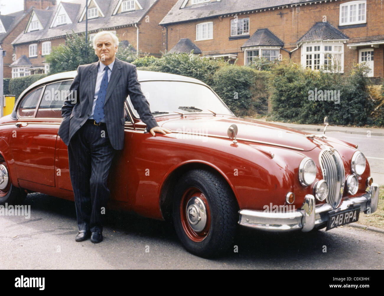 INSPECTOR MORSE  UK TV police series drama produced by Zenith for CIT and Carlton with John Thaw here with his Jaguar MK2 saloon Stock Photo