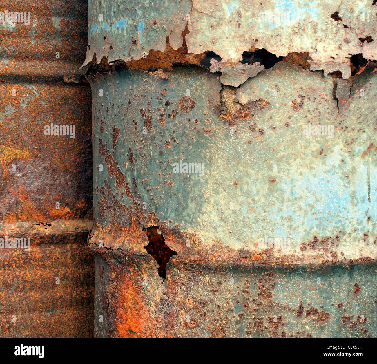 Heavily Corroded Rusted Oil Barrels Stock Photo