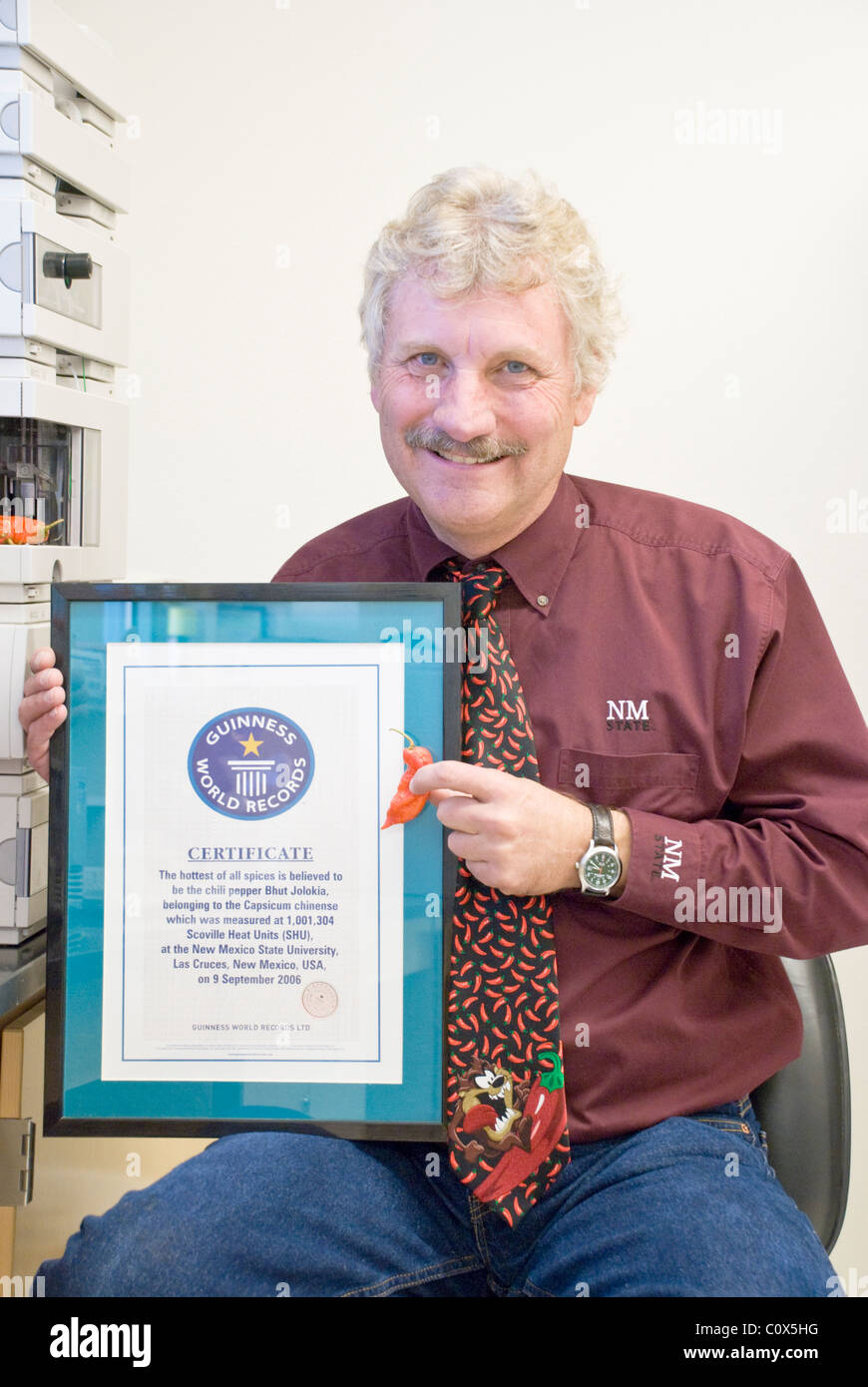 Certified by Guinness World Records, Professor Paul Bosland displays the Bhut Jolokia - once the world's hottest chili pepper. Stock Photo