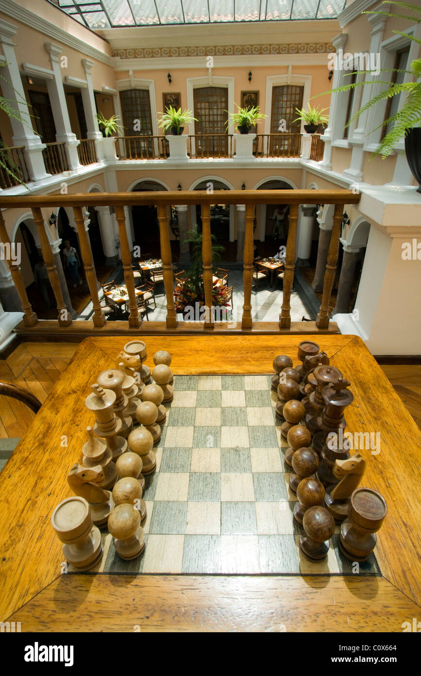 Chess Set and Atrium at Hotel Patio Andaluz - Quito, Ecuador Stock Photo