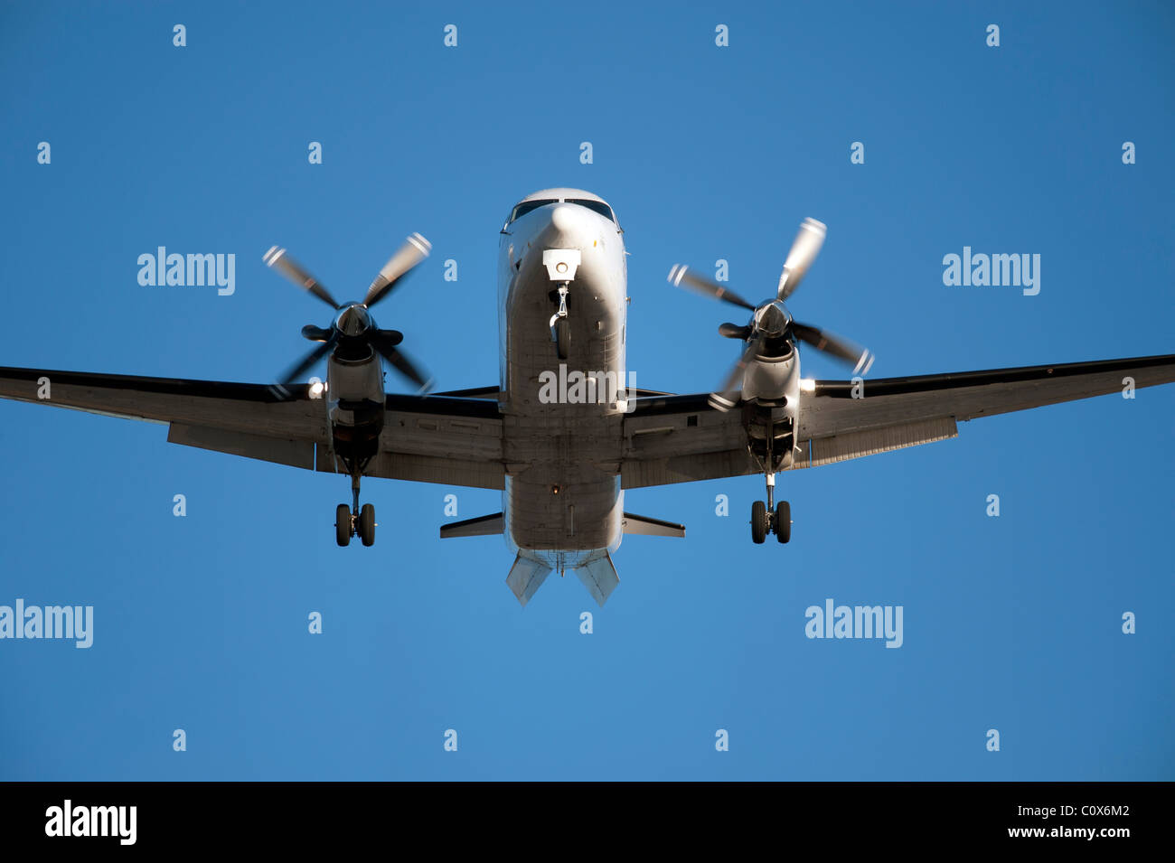 Two propeller engine aircraft before landing in Vancouver Stock Photo