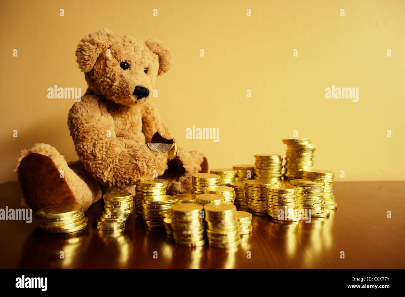 ted-tucks-into-his-chocolate-gold-coin-investment-C0X77Y.jpg