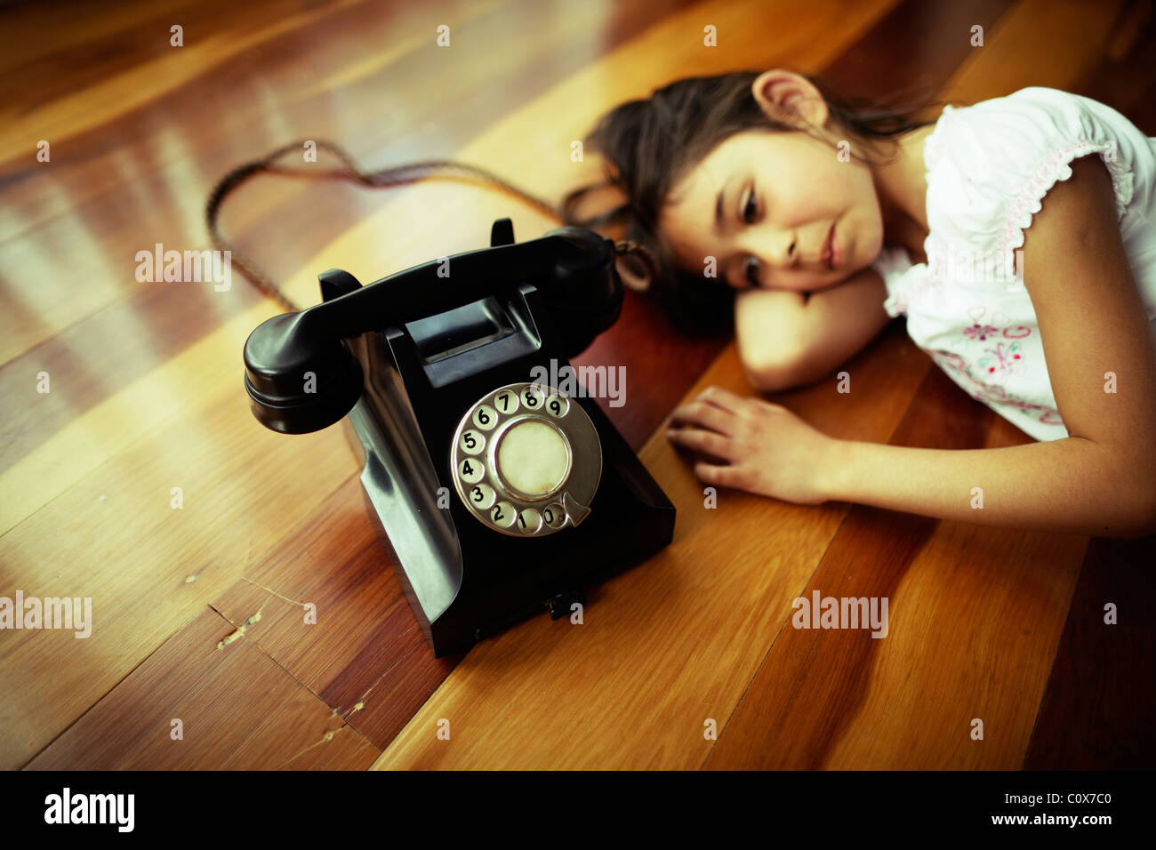 Waiting by the telephone Stock Photo