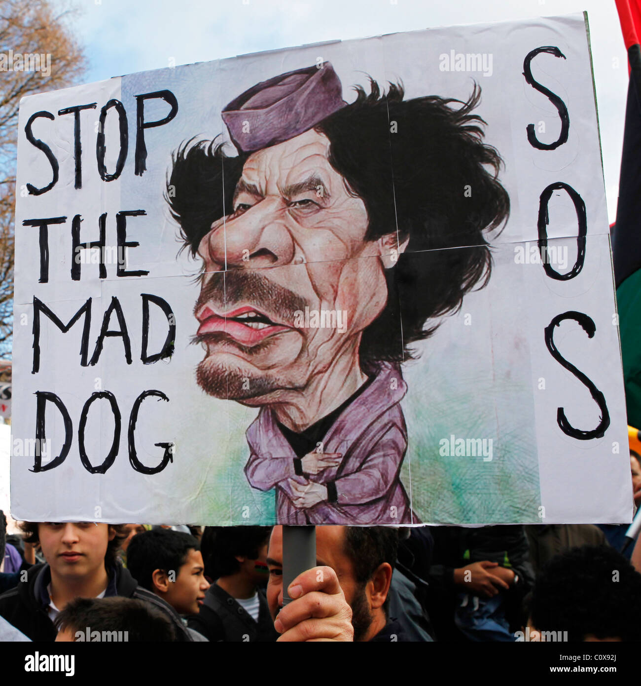 An Anti-Gaddafi sign is held up at a demonstration in support of the 2011 Arab revolutions in Edinburgh, Scotland. Stock Photo