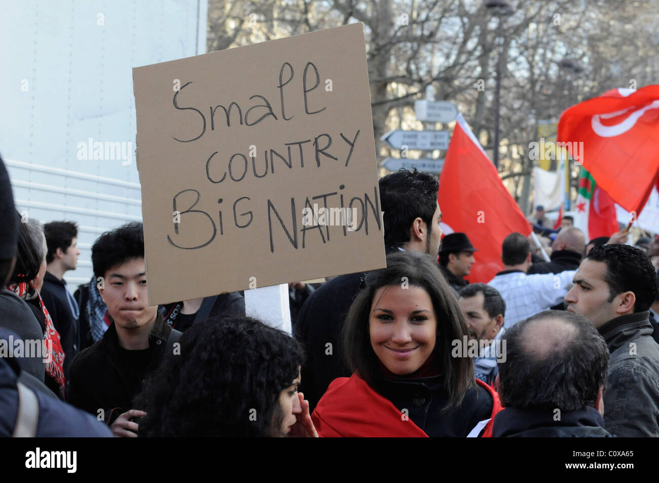 French Tunisian girl celebrating the ouster of Tunisian strongman Ben Ali during a demonstration in Paris, France. Stock Photo
