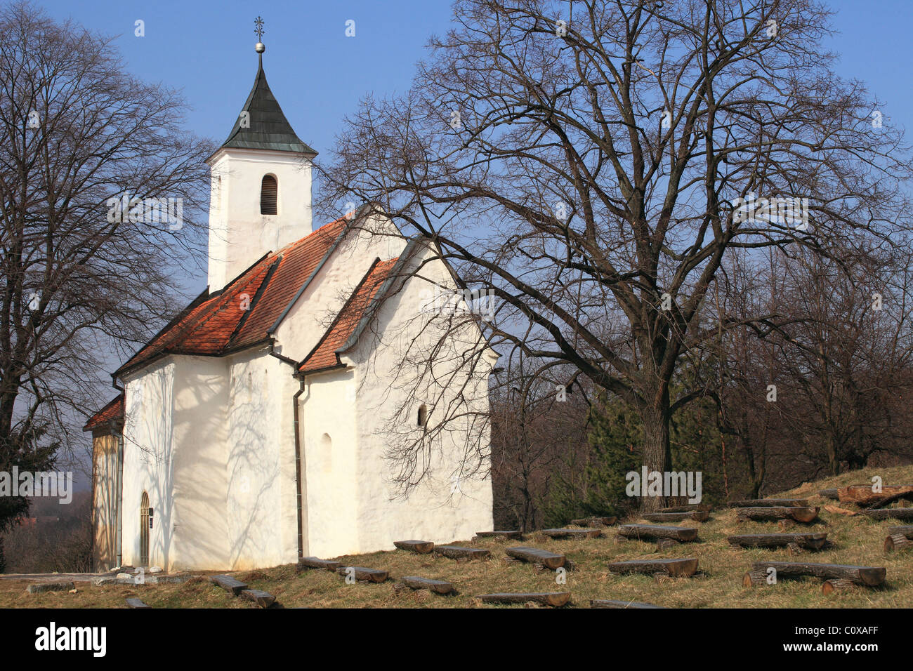 The old Catholic church, from Romanesque period, dedicated to St. George in Kostolany pod Tribecom, Slovakia. Stock Photo