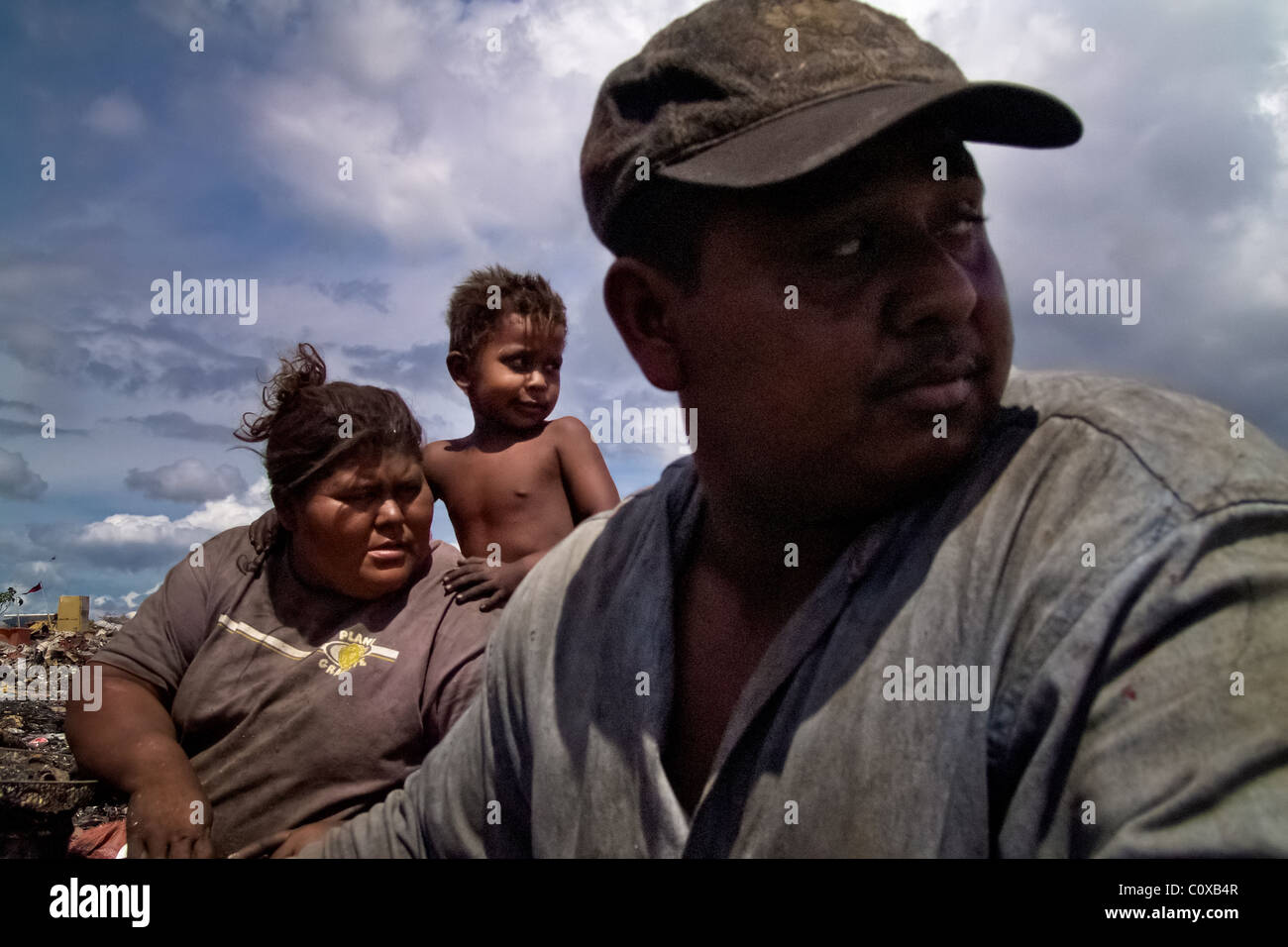 A Nicaraguan family works in the garbage dump La Chureca, Managua, Nicaragua. Stock Photo