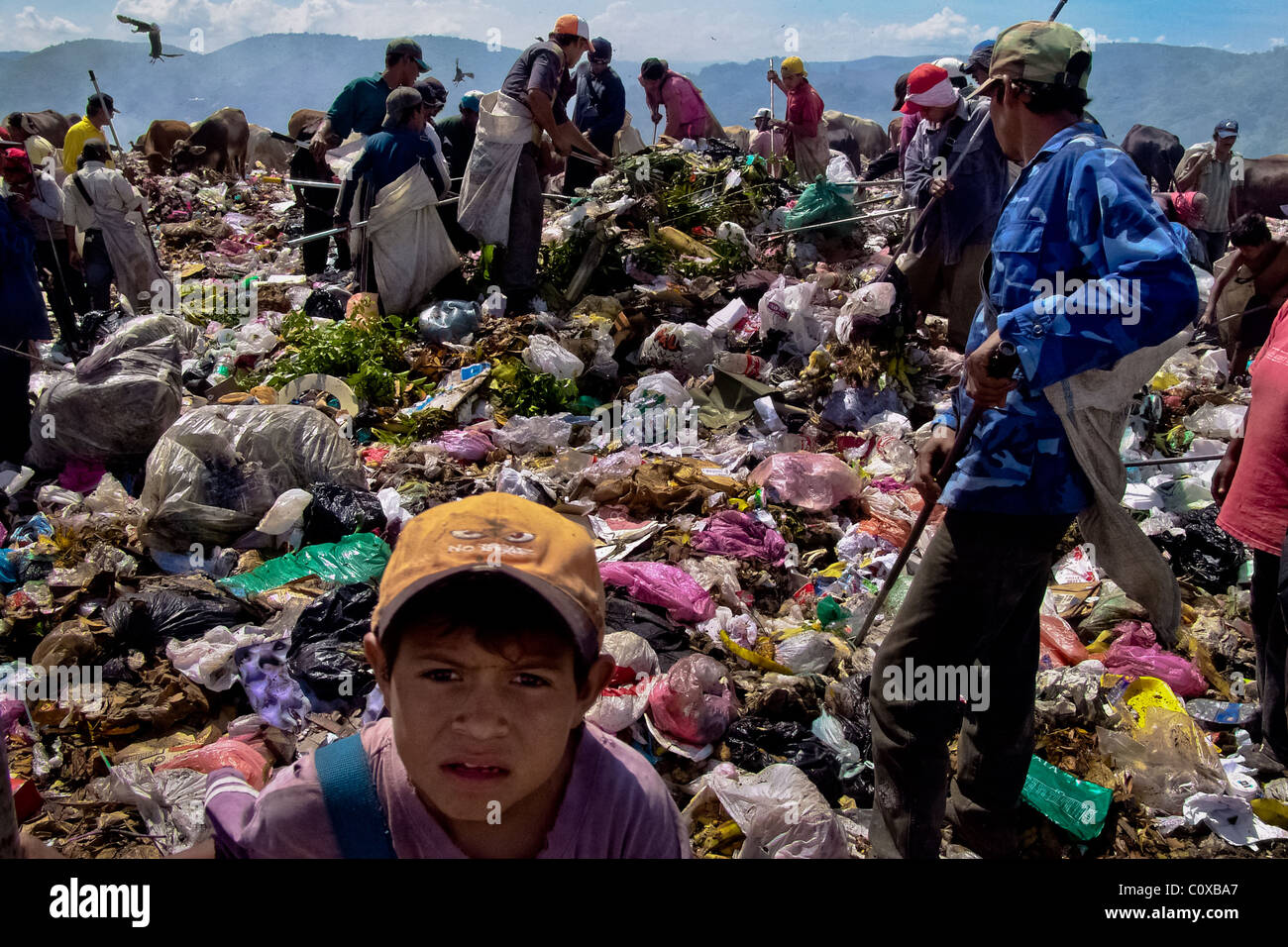 Nicaraguan garbage recollectors work in the garbage dump La Chureca, Managua, Nicaragua. Stock Photo