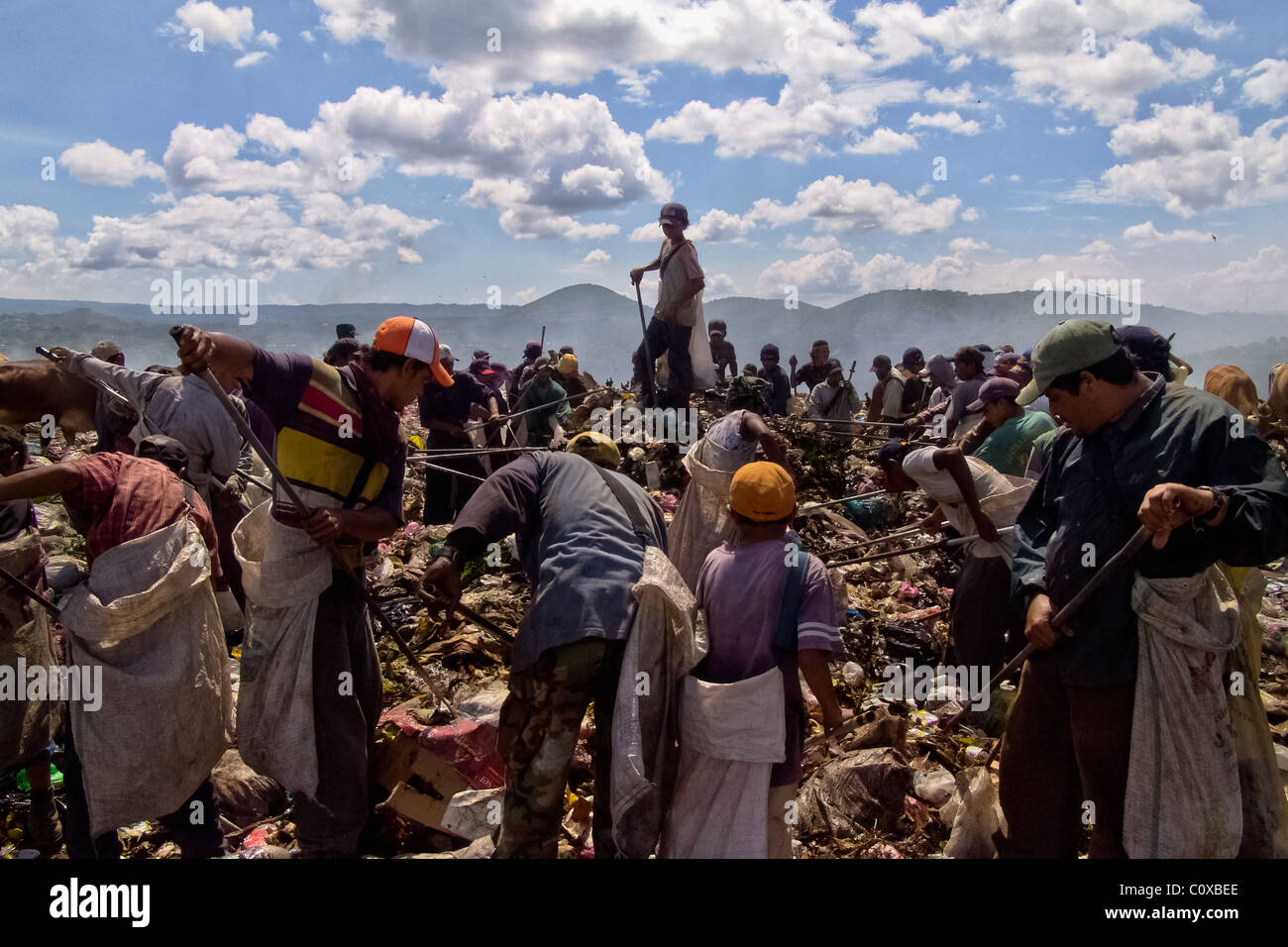Nicaraguan garbage recollectors work in the garbage dump La Chureca, Managua, Nicaragua. Stock Photo