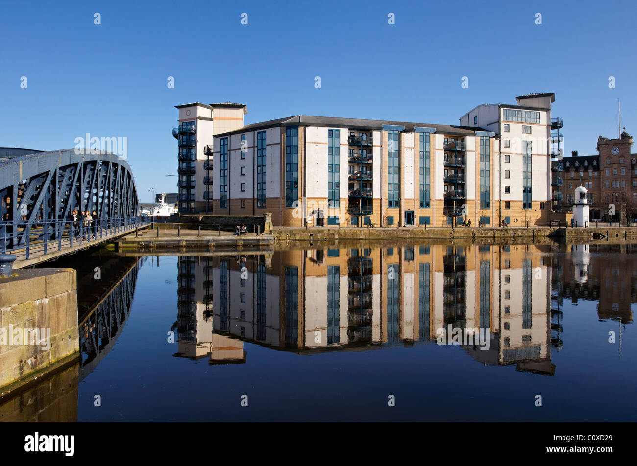 Modern apartment blocks alongside the Water of Leith, Leith, Edinburgh, Scotland, UK Stock Photo