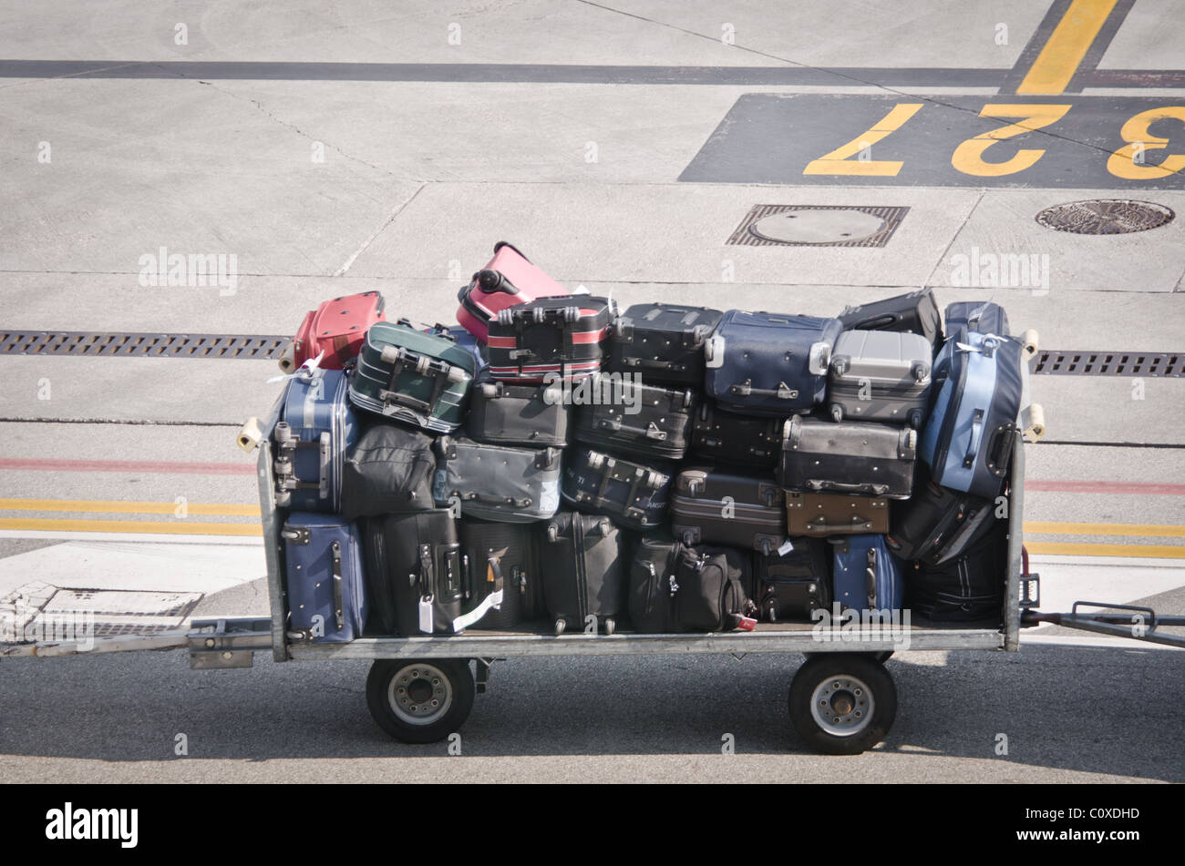 Luggage being transported at airport Stock Photo