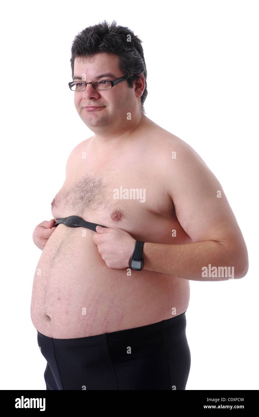 Fat man preparing to workout, adjusting heart rate monitor Stock Photo