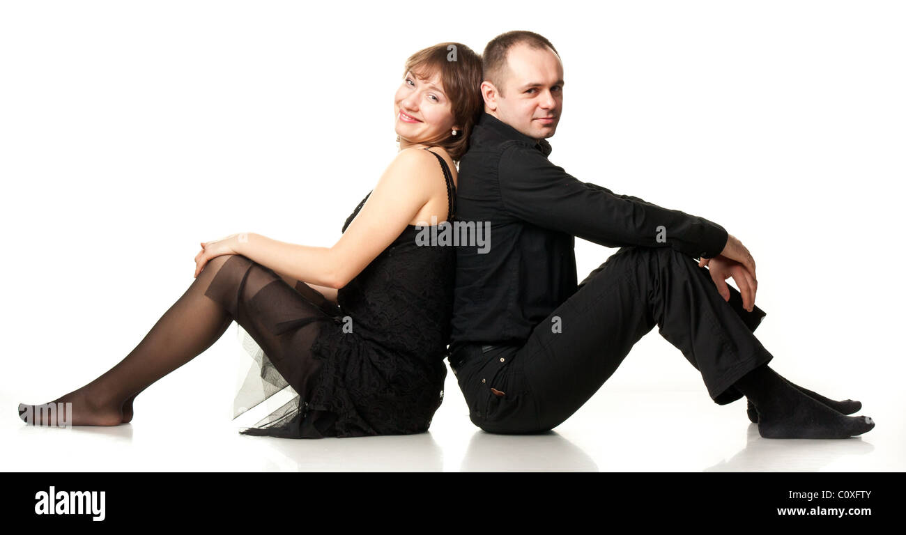 Portrait of a beautiful young happy smiling couple isolated on white ...