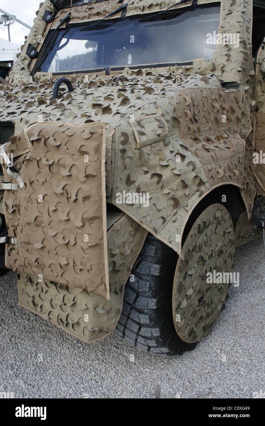 truck in camouflage military army base at open day Stock Photo - Alamy