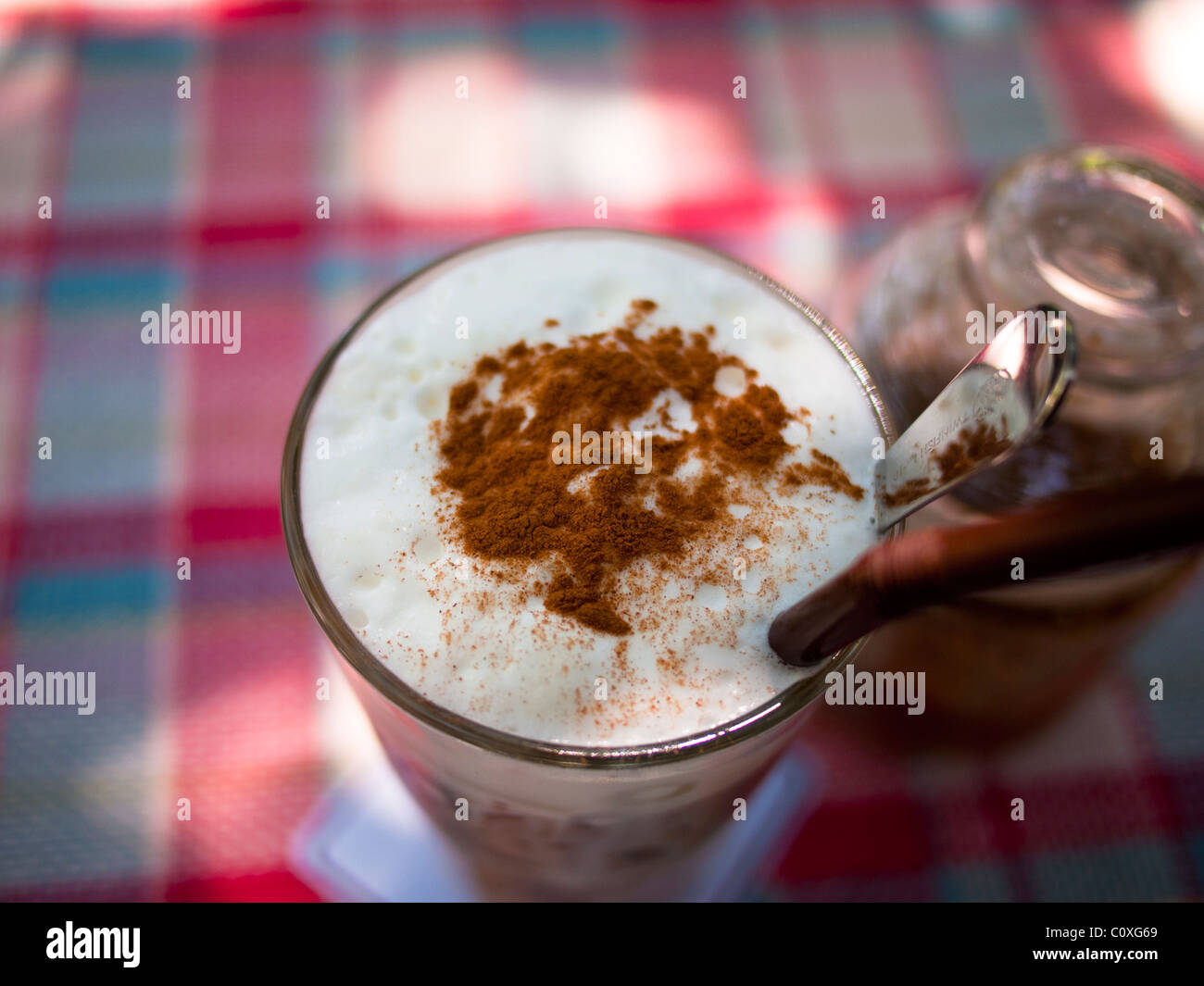 Ice Cappuccino Coffee on top of a garden table Stock Photo