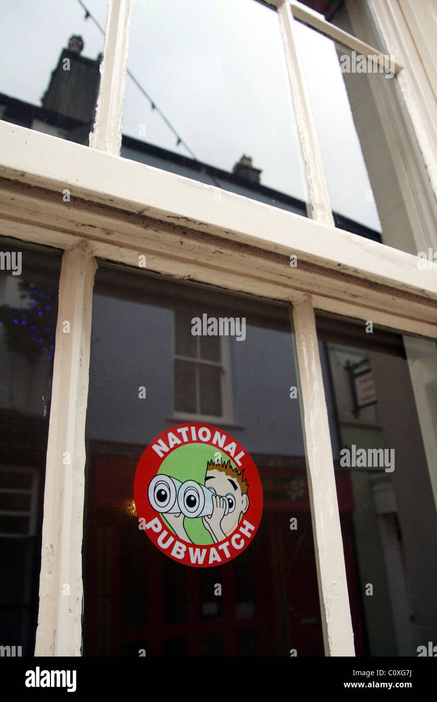 pub watch sticker in pub window in caernarfon, north wales Stock Photo