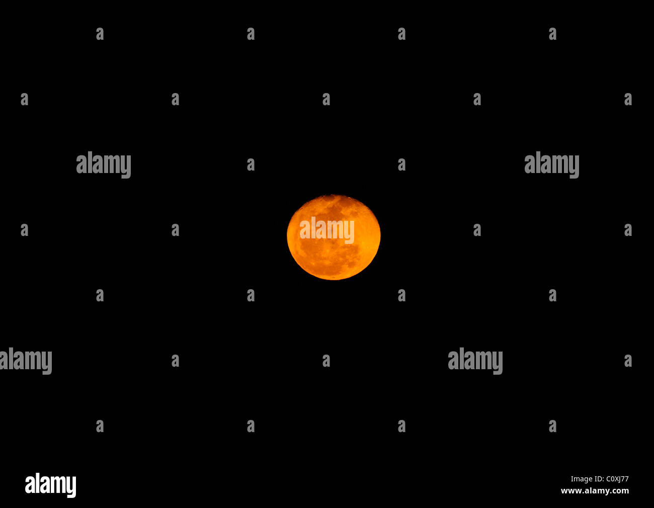 Moon against dark sky Stock Photo