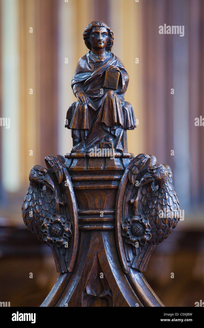 A wooden carving on the end of a pew in the chancel. Holy Trinity Church, Hull, East Yorkshire. Stock Photo