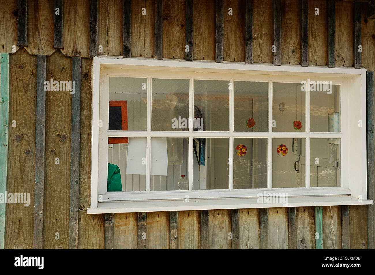 Wooden window frame of an oyster hut in the Piraillan Village, Cap Ferret, department of Gironde, France Stock Photo