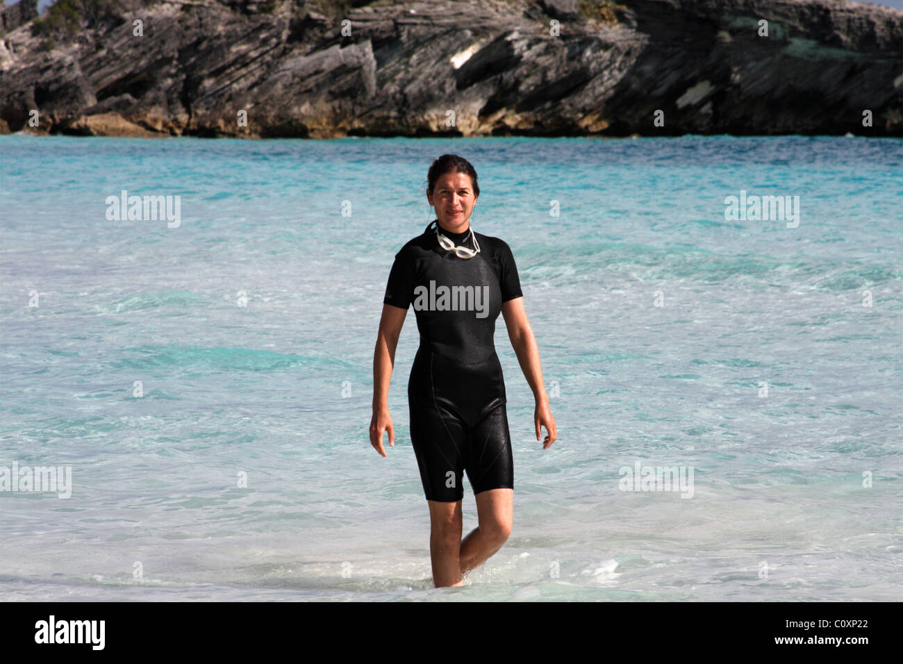 Woman with wetsuit, Horseshoe Bay, Bermuda Stock Photo Alamy