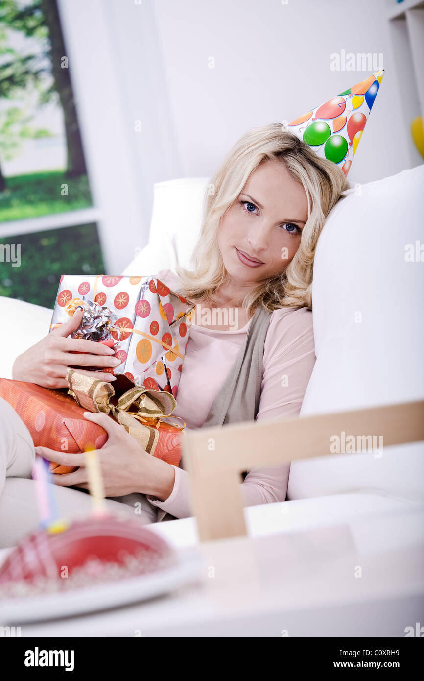 young woman with gifts Stock Photo