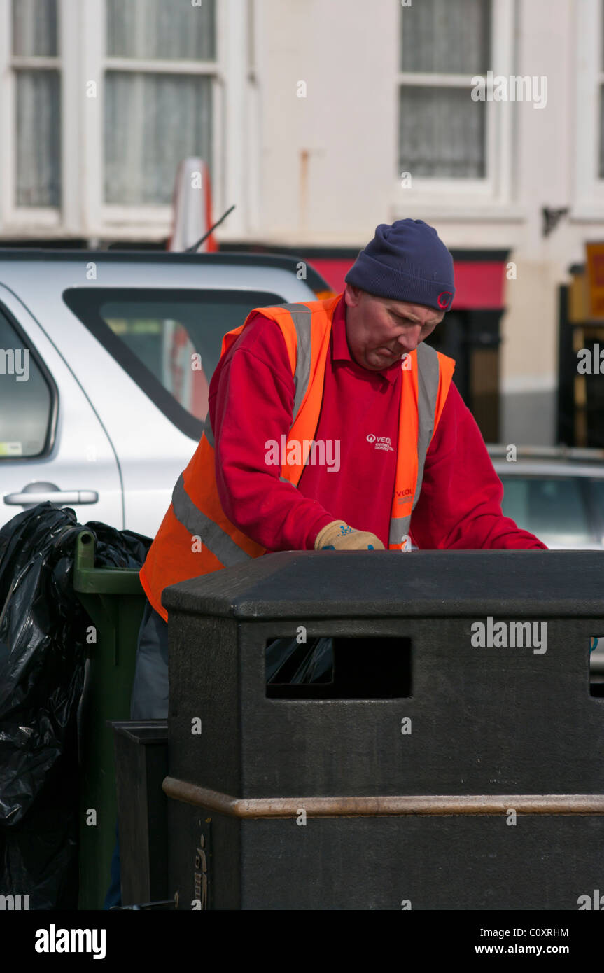 Street Cleaner Emptying Street Litter Bins Stock Photo