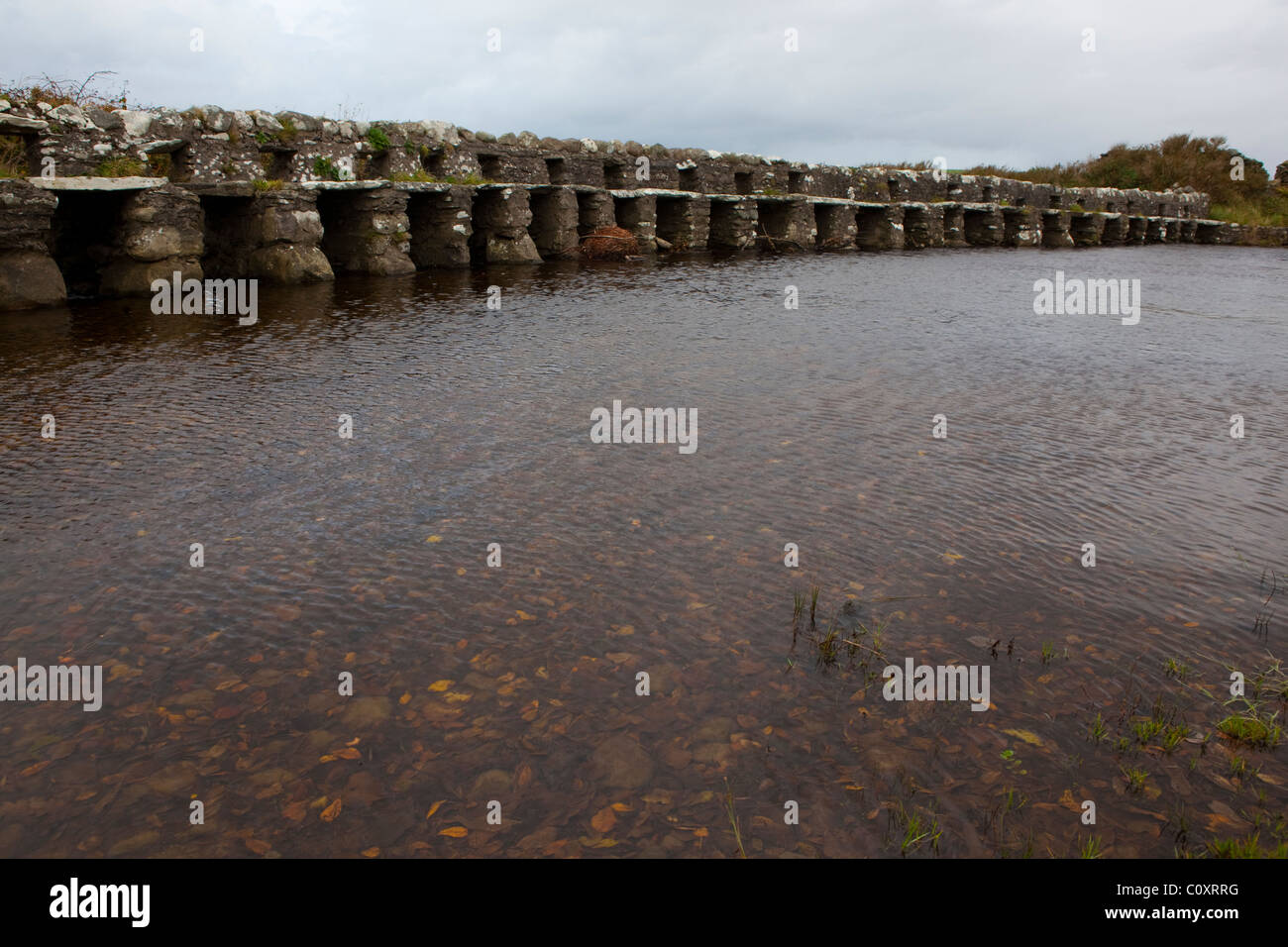 Clapper Bridge, Mayo, built by a John Alexander, a member of a Protestant colony in the 1840s. Stock Photo