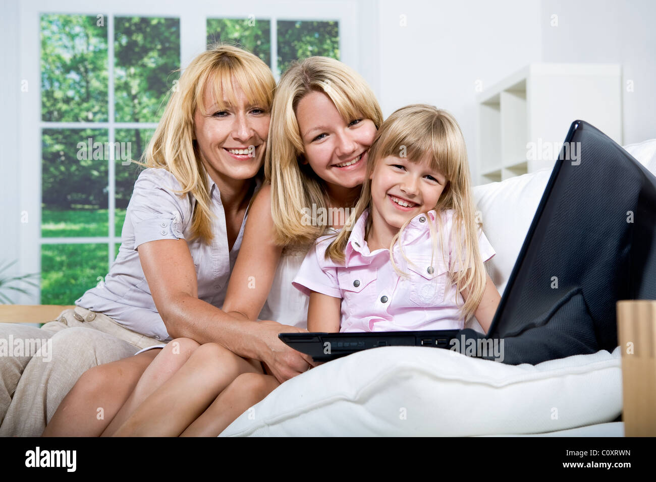 family with laptop Stock Photo