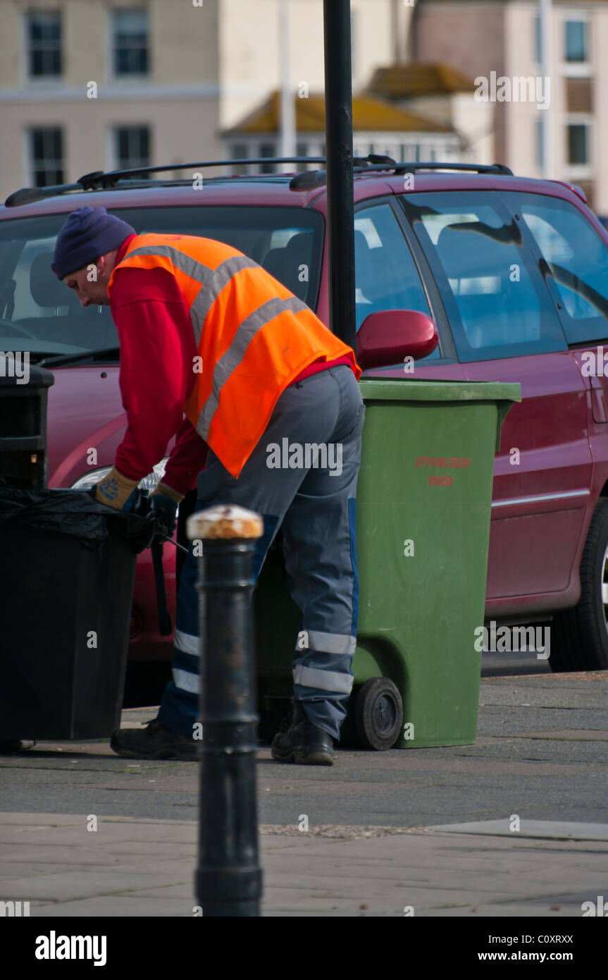 Street Cleaner Emptying Street Litter Bins Stock Photo