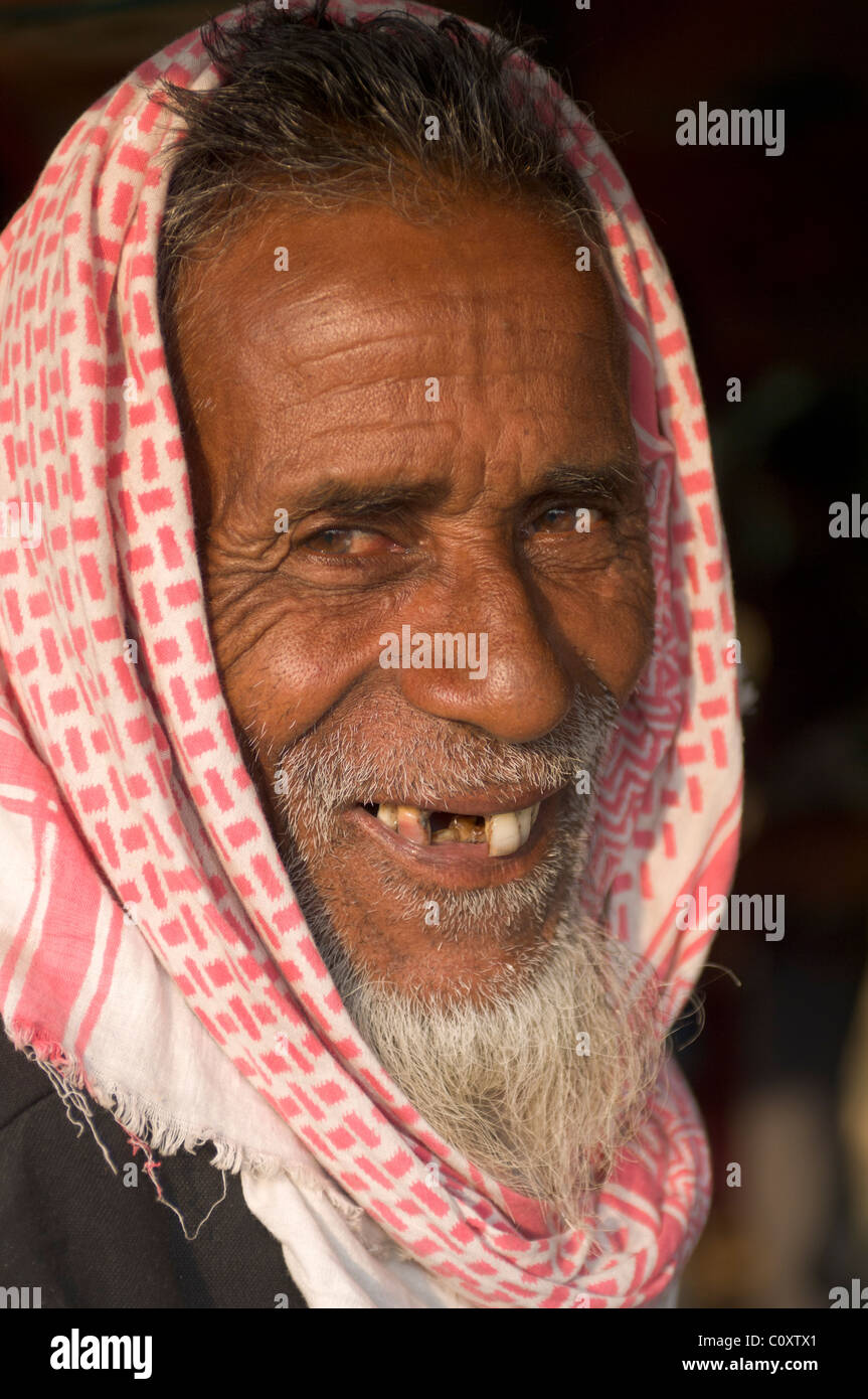 Bearded man with missing teeth wearing a head scarf at the Sonepur Mela, Sonepur Mela, Sonepur, Bihar, India Stock Photo