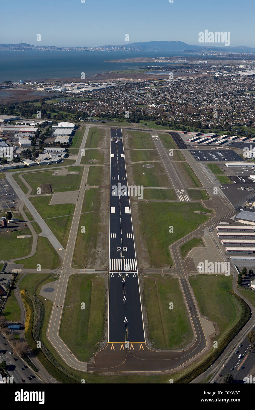 aerial view above runway 28L toward San Francisco Hayward Airport California Stock Photo