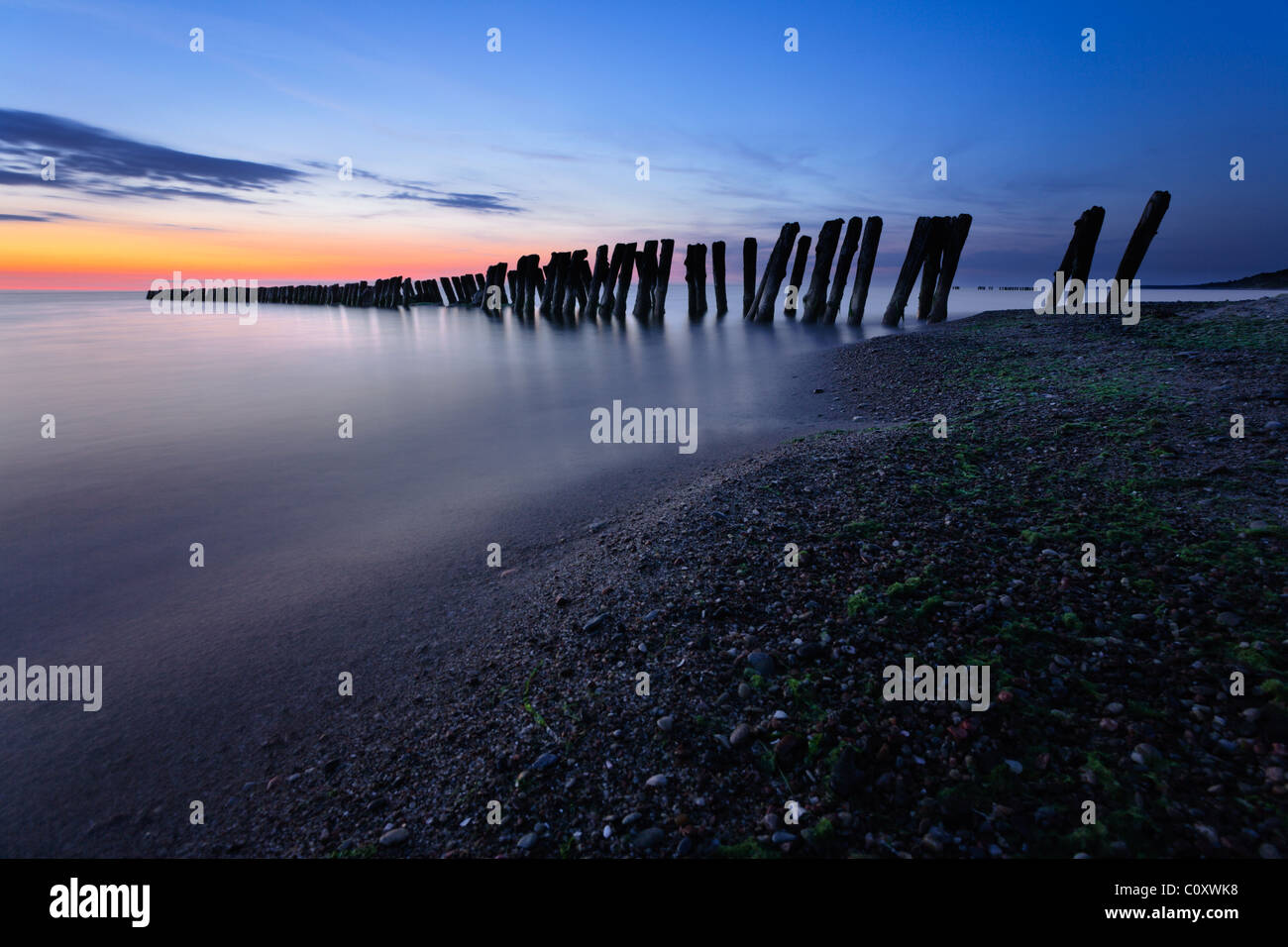 Breakwaters at twilight. Baltic Sea, Russia Stock Photo