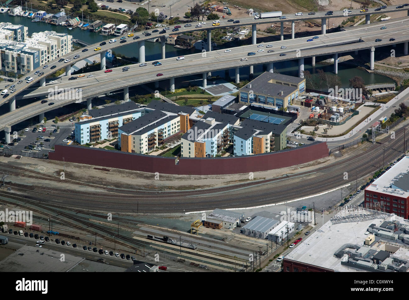 aerial view above residential apartment housing adjacent to CalTrain rail road line  interstate I-280 San Francisco California Stock Photo