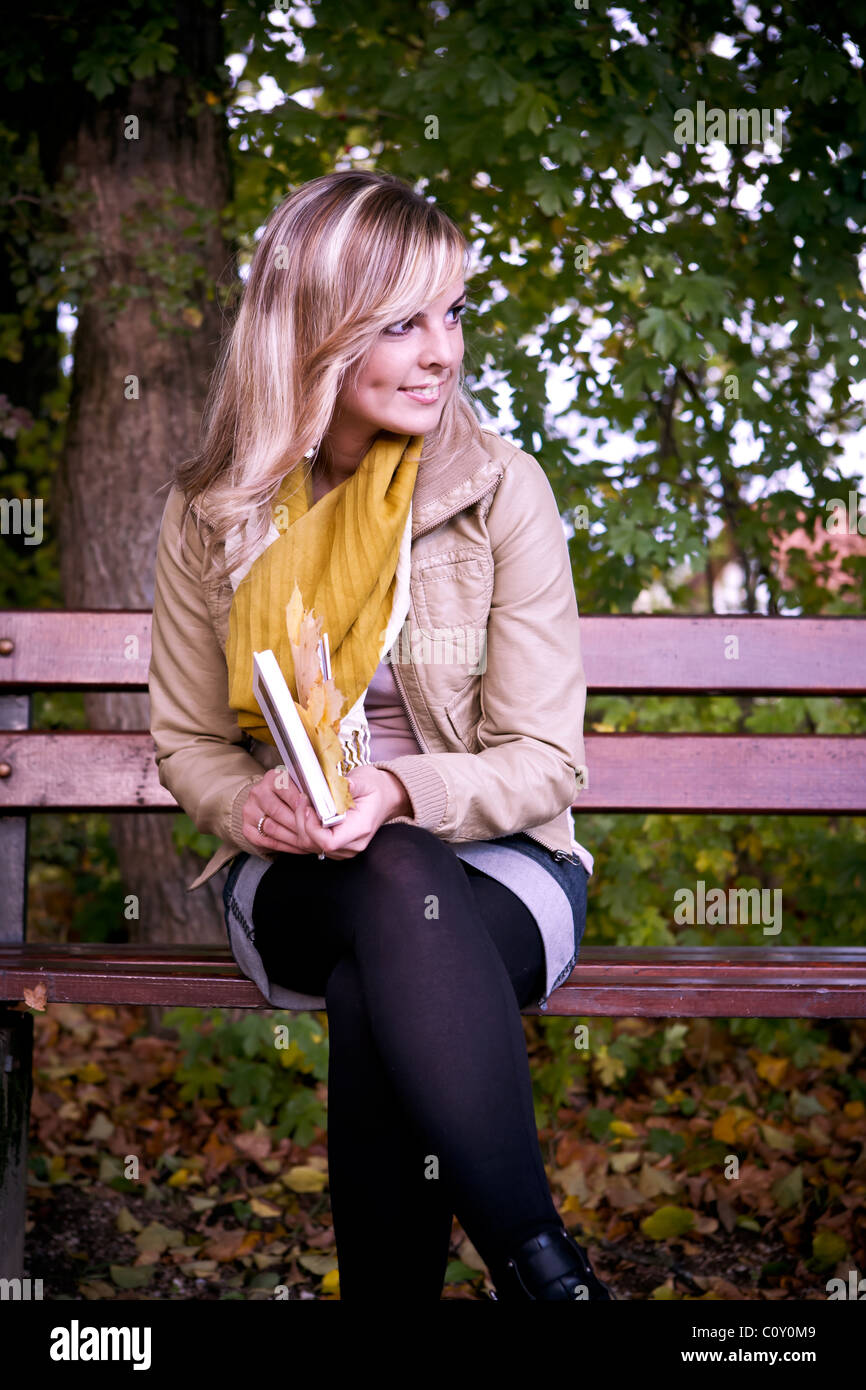 woman in the autumn park Stock Photo - Alamy