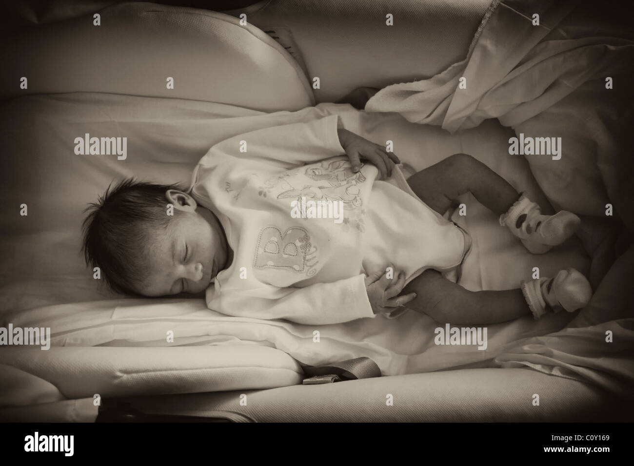 Newborn Baby Girl Sleeping inside her Crib Stock Photo Alamy