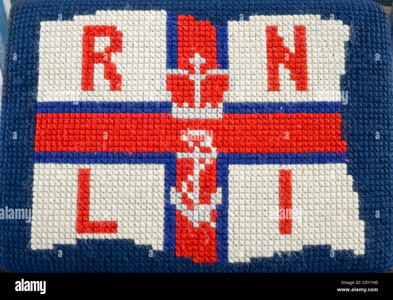 RNLI logo in needlework on a church hassock. Stock Photo