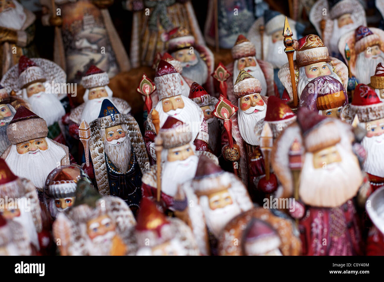 Hand carved and painted traditional Russian 'Santa Claus' figures on sale in Izmaylovo market, Moscow, Russia Stock Photo