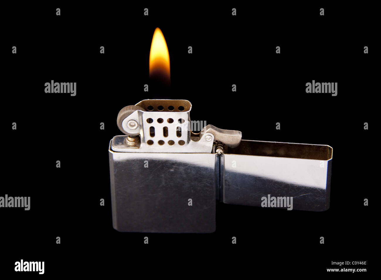 Lighter with flame Stock Photo