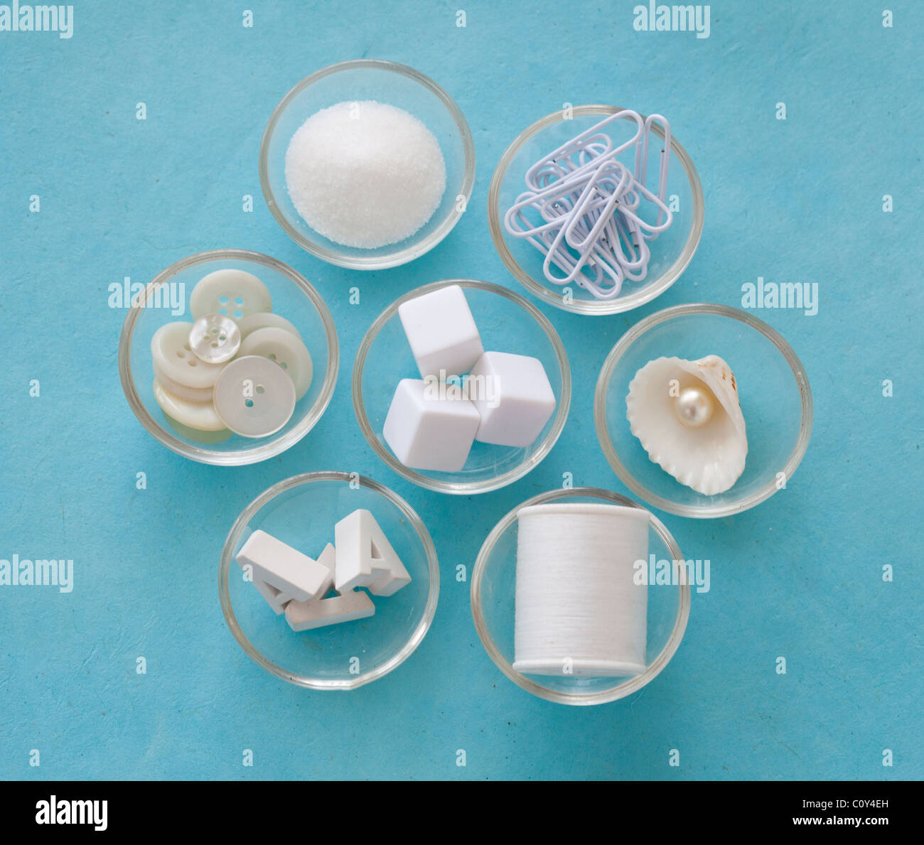collection of knick knacks in bowls Stock Photo Alamy